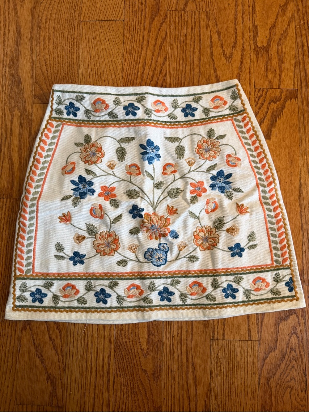 Francesca's Collections White Mini Skirt with Blue & Orange Floral Embroidery